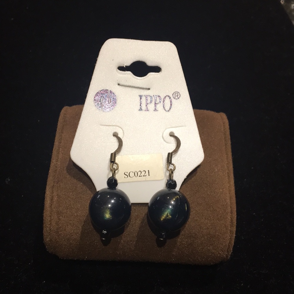 Green colored ball drop earrings
